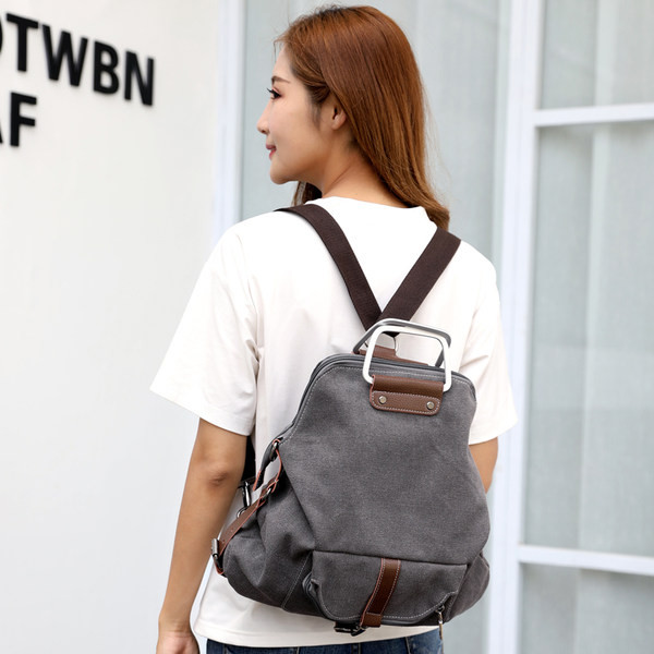 Naiste igapäevane metallist elemendiga tekstiilist seljakott