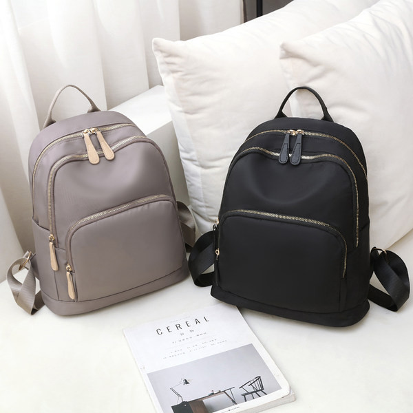 Tekstilni ruksak novi model sa više pretinaca