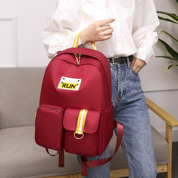 Embleemiga igapäevane naiste tekstiilist seljakott