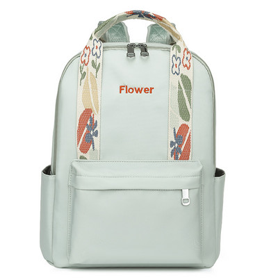 Naiste igapäevane seljakott tikitud kirja ja taskuga