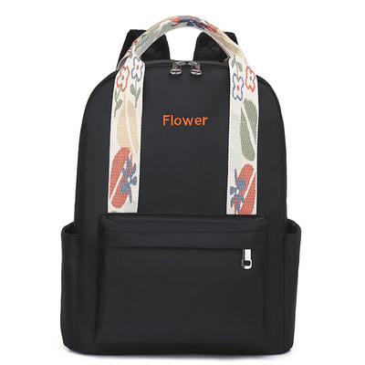 Naiste igapäevane seljakott tikitud kirja ja taskuga