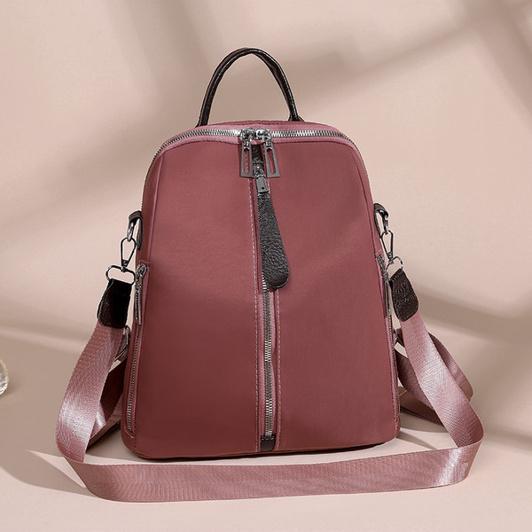 Ženski ruksak s prednjim patentnim zatvaračem i tekstilnom ručkom