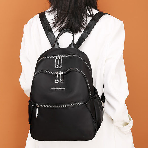 Ruksak od tekstila s metalnim elementom za žene