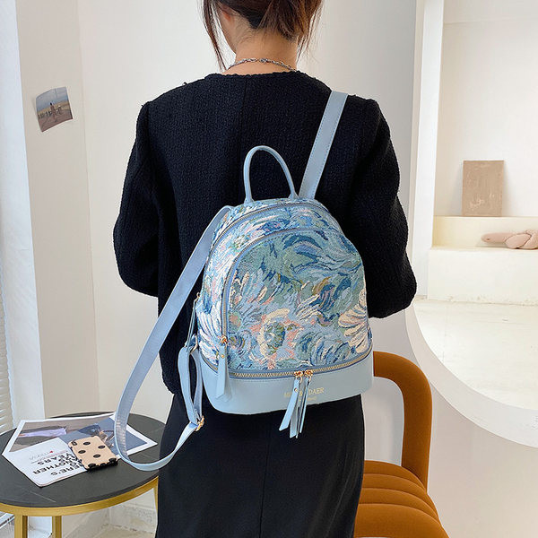 Spalvinga kuprinė su užtrauktukais - moterims