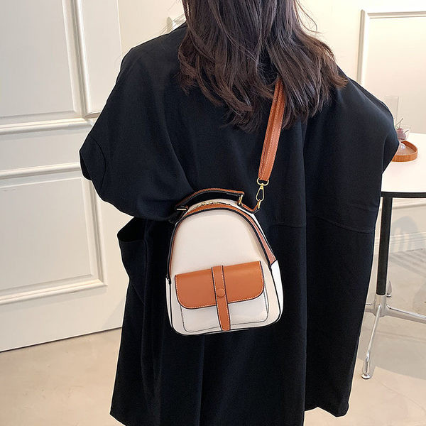 Ženski ruksak od umjetne kože s prednjim džepom