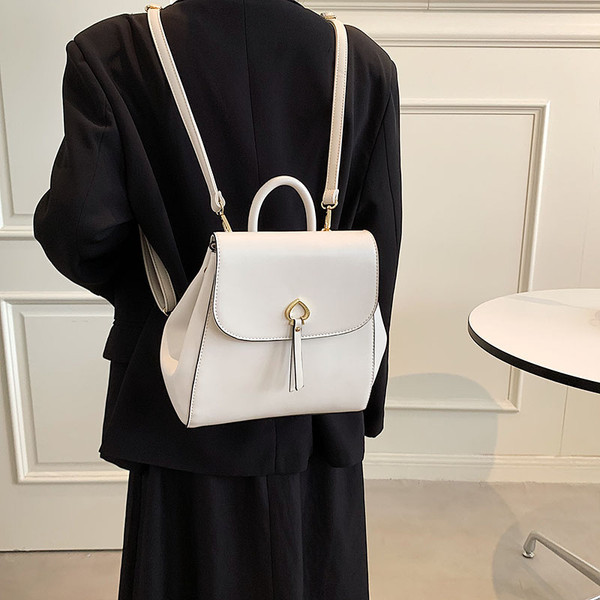 Naiste seljakott ökonahast metallist kaunistuse ja tutiga