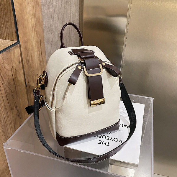 Väike naiste nahast seljakott õlasanguga