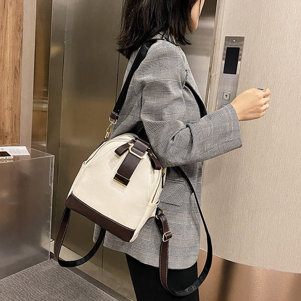 Väike naiste nahast seljakott õlasanguga