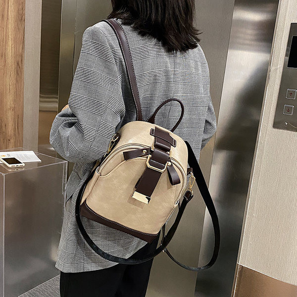 Väike naiste nahast seljakott õlasanguga