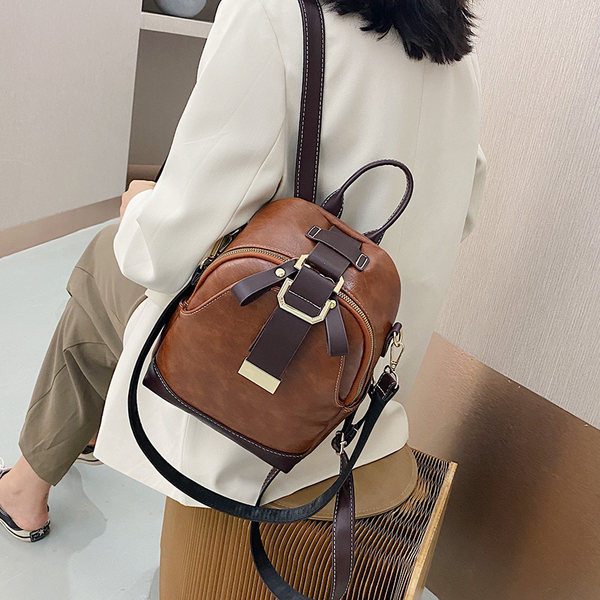 Väike naiste nahast seljakott õlasanguga