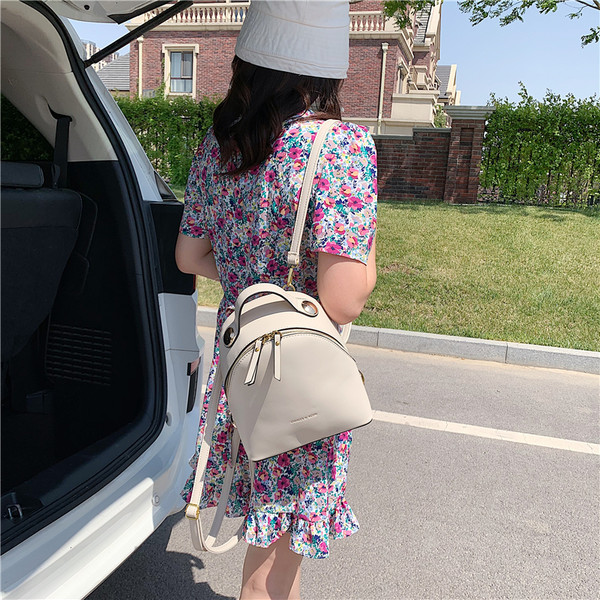 Naiste mini-nahast seljakott kirja ja tõmblukuga