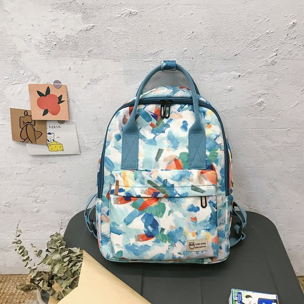 Πολύχρωμο γυναικείο σακίδιο πλάτης με τσέπη