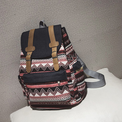 Naiste tekstiilist seljakott lipsude ja aplikatsiooniga