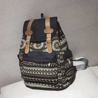 Naiste tekstiilist seljakott lipsude ja aplikatsiooniga