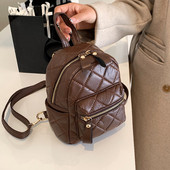 Väike tepitud efektiga naiste seljakott