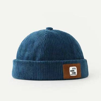 Igapäevane laste embleemiga triibuline müts poistele