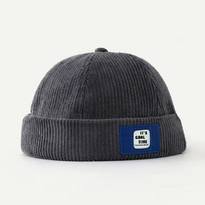 Igapäevane laste embleemiga triibuline müts poistele