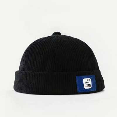 Igapäevane laste embleemiga triibuline müts poistele