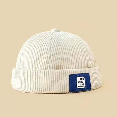 Igapäevane laste embleemiga triibuline müts poistele