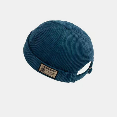 Igapäevane laste embleemiga triibuline müts poistele