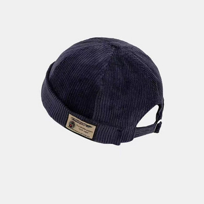 Igapäevane laste embleemiga triibuline müts poistele