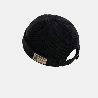 Igapäevane laste embleemiga triibuline müts poistele