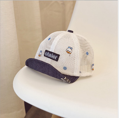 Laste võrgust müts teksatükkide ja tikandiga