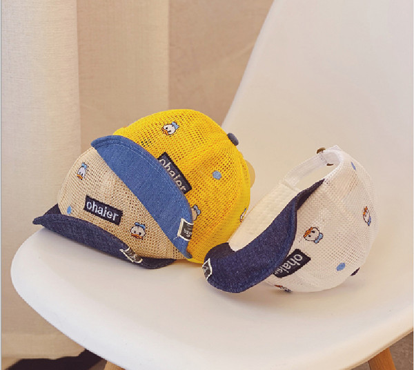 Laste võrgust müts teksatükkide ja tikandiga