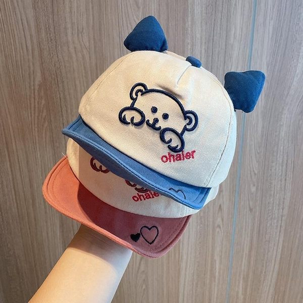 Beebi kevadmüts tikandi ja visiiriga