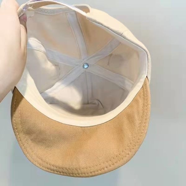 Beebi kevadmüts tikandi ja visiiriga