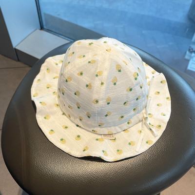 Päikesekaitsega beebimüts paela ja aplikatsiooniga