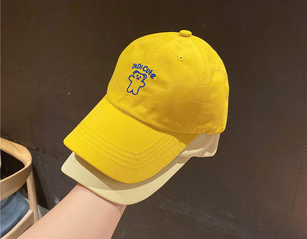 Tekstiilist müts visiiri ja tikandiga - mitut värvi