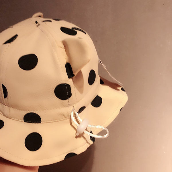 Igapäevane täppidega lastemüts tüdrukutele