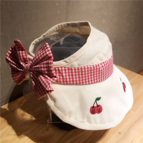 Tekstiilist tikandi ja paelaga lastemüts tüdrukutele