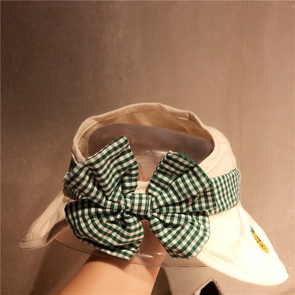 Tekstiilist tikandi ja paelaga lastemüts tüdrukutele