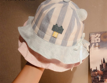 Бебешка текстилна шапка с връзки