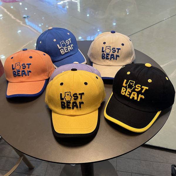 Tikitud sildi ja visiiriga beebimüts poistele ja tüdrukutele