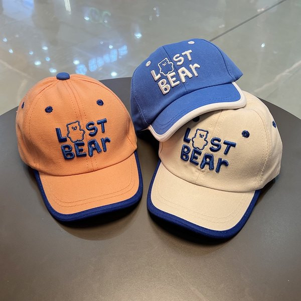 Tikitud sildi ja visiiriga beebimüts poistele ja tüdrukutele