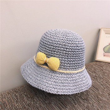 Детска плетена шапка с панделка
