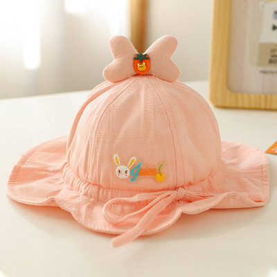 Beebi tekstiilist müts tikandi ja lipsudega