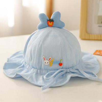 Beebi tekstiilist müts tikandi ja lipsudega