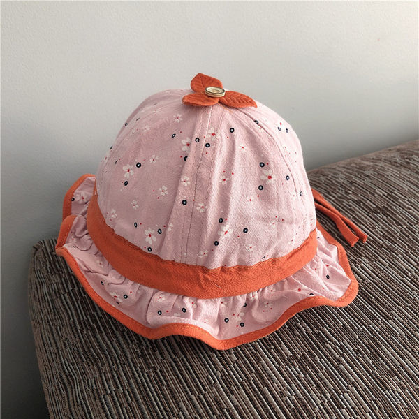 Beebi tekstiilist lokkidega müts