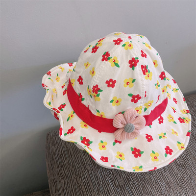 Υφασμάτινο καλοκαιρινό καπέλο με λουλουδάτο μοτίβο
