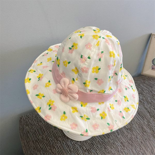 Υφασμάτινο καλοκαιρινό καπέλο με λουλουδάτο μοτίβο