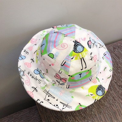 Värvilise mustri ja lipsudega beebimüts