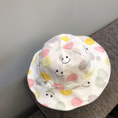 Värvilise mustri ja lipsudega beebimüts