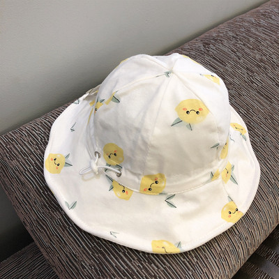 Värvilise mustri ja lipsudega beebimüts