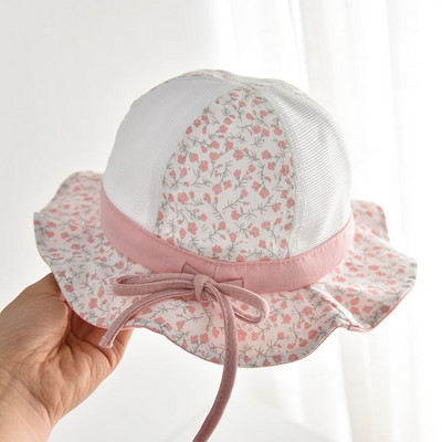 Lillemotiivide ja paelaga võrkkangast lastemüts