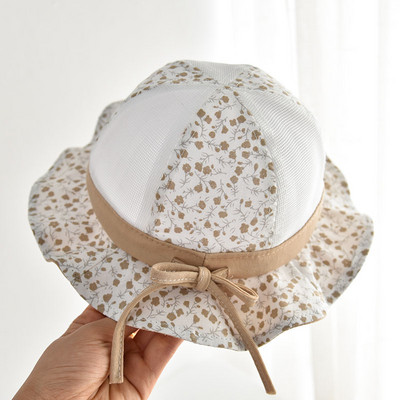 Lillemotiivide ja paelaga võrkkangast lastemüts