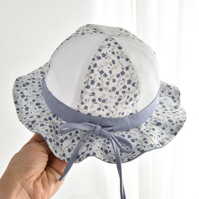 Lillemotiivide ja paelaga võrkkangast lastemüts